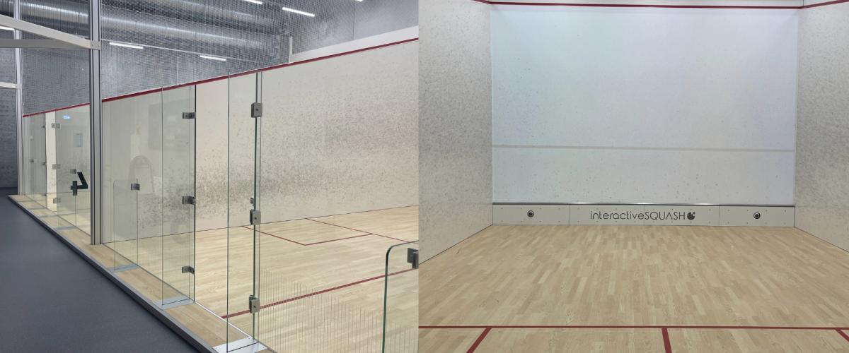 Bildet viser squashbaner på Åsane Arena med glassvegger og en interaktiv squashvegg, markert med røde linjer på tregulv.